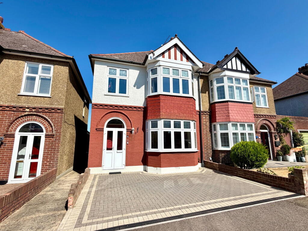 Main image of property: A Smartly Presented & Extended 1930's Home In Darland - Zetland Avenue
