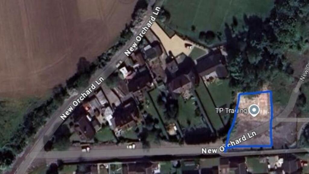 New Orchard Lane aerial photo with blue line.jpe