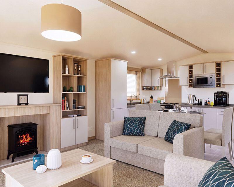 2-bed caravan on NEW low-rate site fee band available on selected plots, £102,995