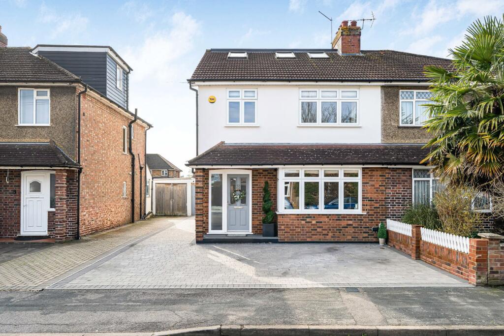 Main image of property: Hythe Field Avenue, Egham, Surrey, TW20