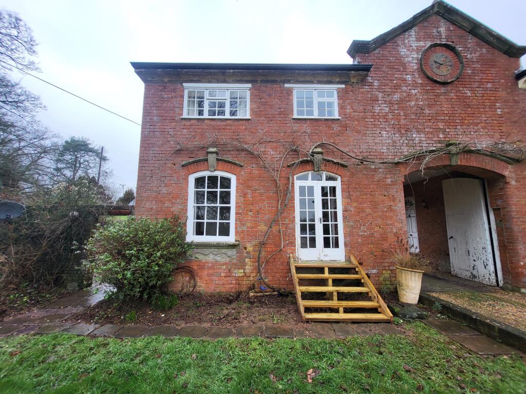 Main image of property: The Clock House