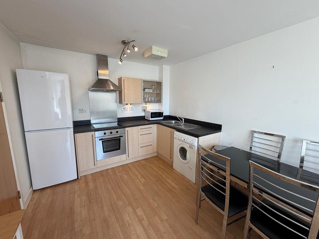 Main image of property: **INVESTMENT SALE** OCTAHEDRON TOP FLOOR 1 BED WITH SECURE PARKING