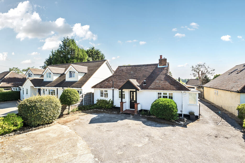 Main image of property: Downsview Avenue, Woking, GU22
