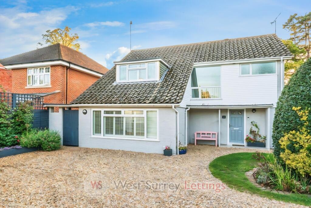 Main image of property: Greenway, West Byfleet, KT14 6QZ