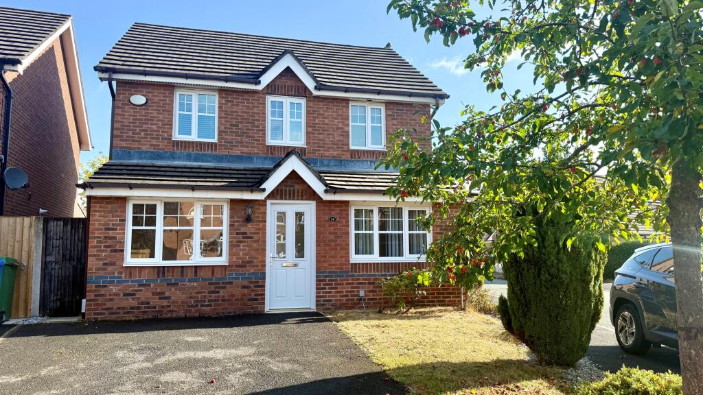 Main image of property: Larkspur Grove, Warrington WA5 1BP