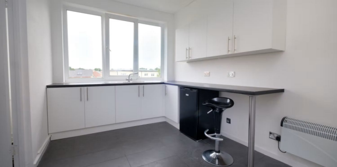 Unit 2 Upstairs Kitchen png.png