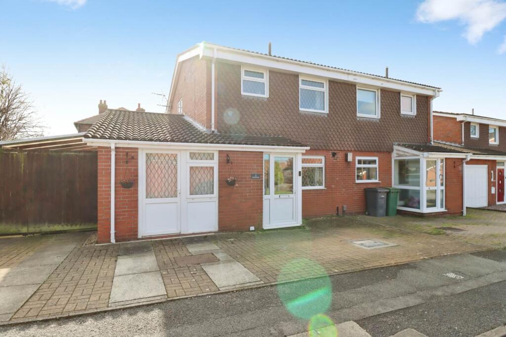 Main image of property: Parkwood Close, Bromborough