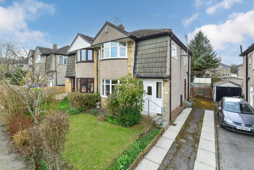 Main image of property: Woodside Crescent, Cottingley, Bingley, West Yorkshire, BD16