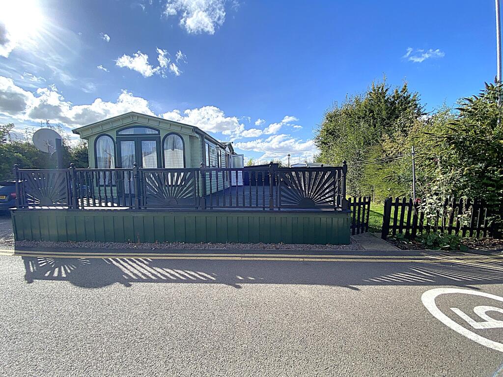 Main image of property: Heron Orchard Holiday Park, Frostley Gate