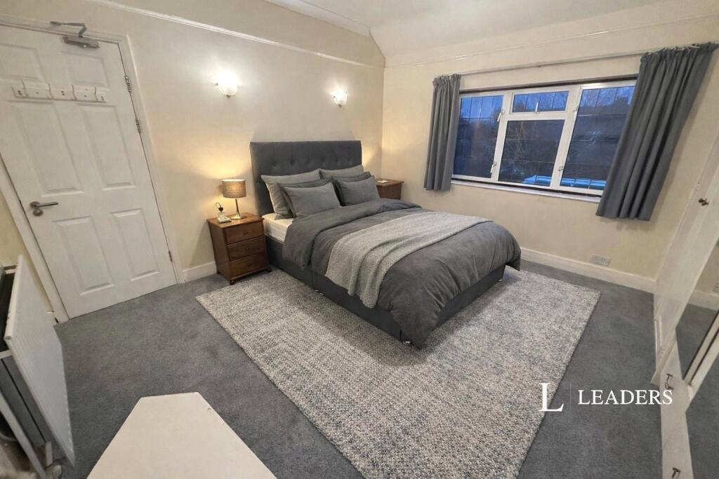 Main image of property: Burwood Road, Hersham, Walton-on-Thames, KT12