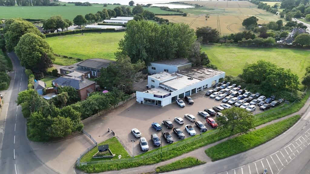 Main image of property: The Former Swan Garage, Delling Lane, Bosham, West Sussex, PO18 8NN