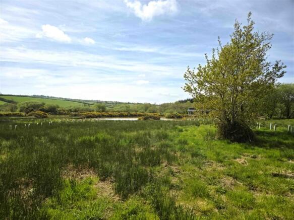Plot 13 looking south west to lakes.jpg