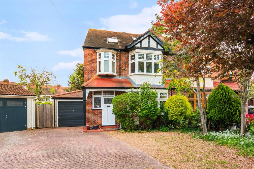 Main image of property: Woodlands, Raynes Park