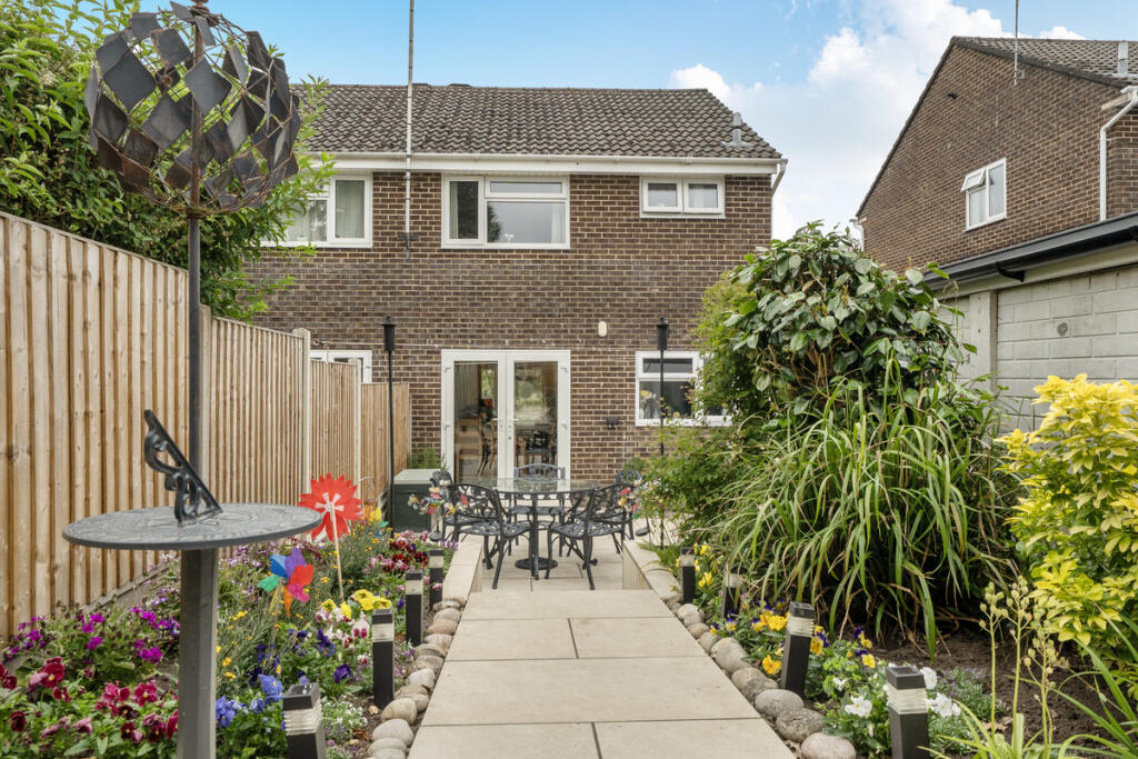Main image of property: Curlew Close, Ferndown, BH22 9
