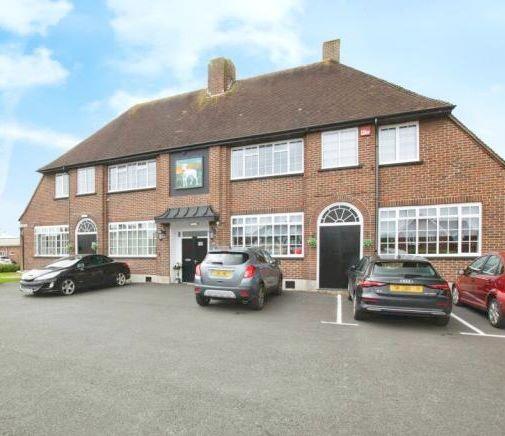 Main image of property: Flat 1 White Hart House, 89 Castle Street, Portchester, Fareham, Hampshire, PO16 9QQ