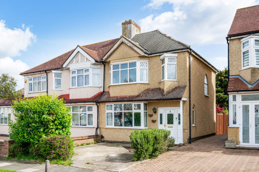 Main image of property: Carlingford Road, Morden, SM4