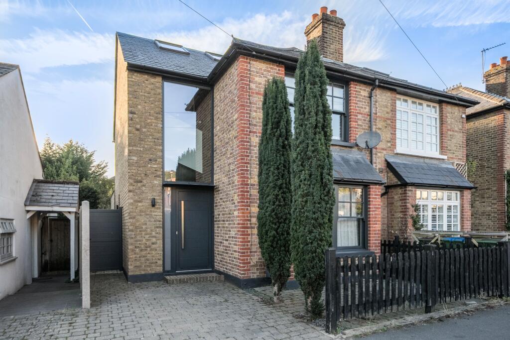 Main image of property: Coverts Road, Claygate, KT10