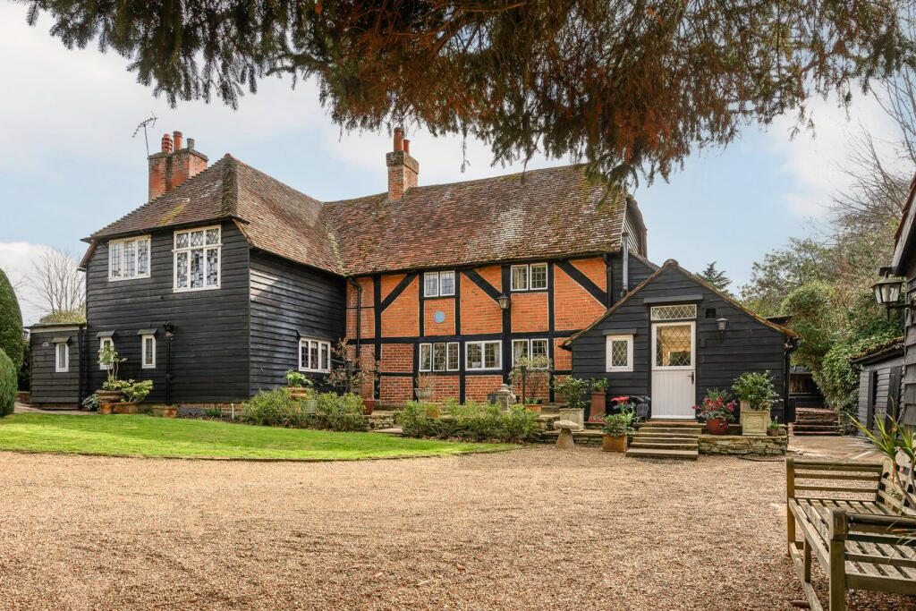 Main image of property: The Ridings, Cobham, KT11