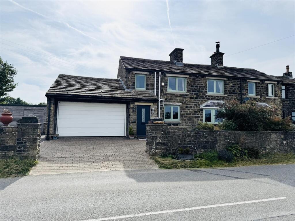 Main image of property: Piperwell Cottage, Cumberworth, Huddersfield, HD8 8YA