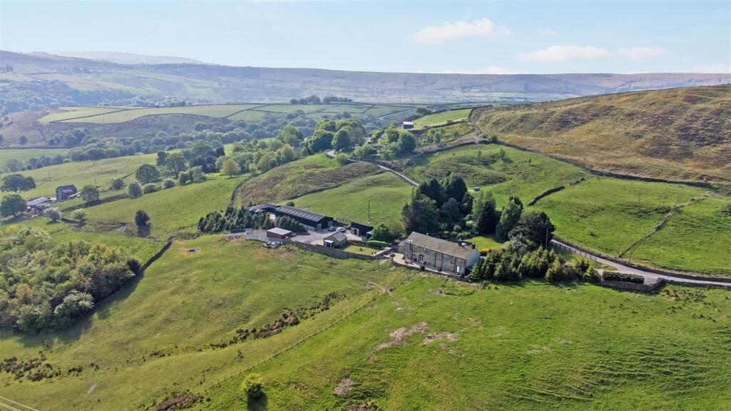 Main image of property: Pike End Farm, Rishworth, Sowerby Bridge, West Yorkshire, HX6 4RG