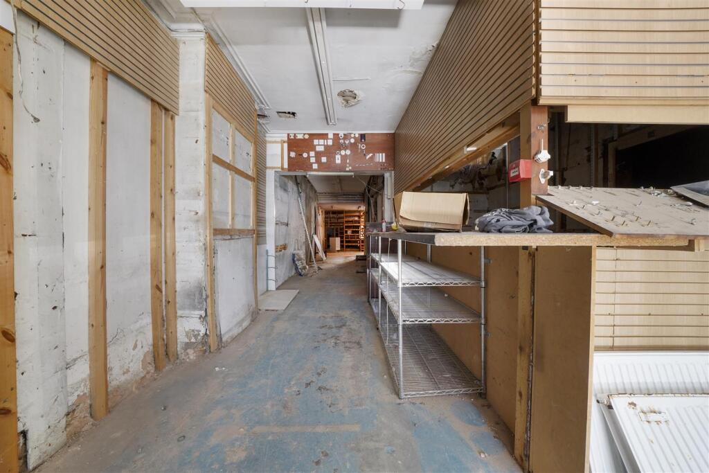 Front of house with shop front