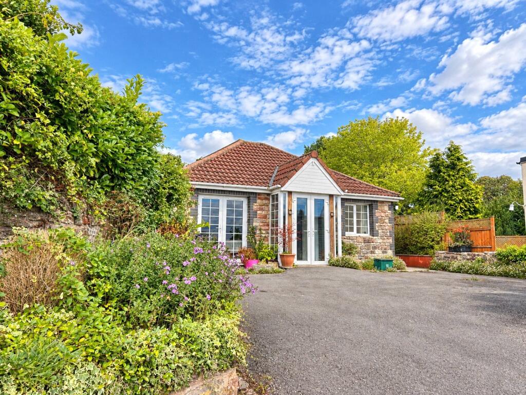 Main image of property: Spacious two-bedroom bungalow with countryside views in a sought-after village, East Harptree