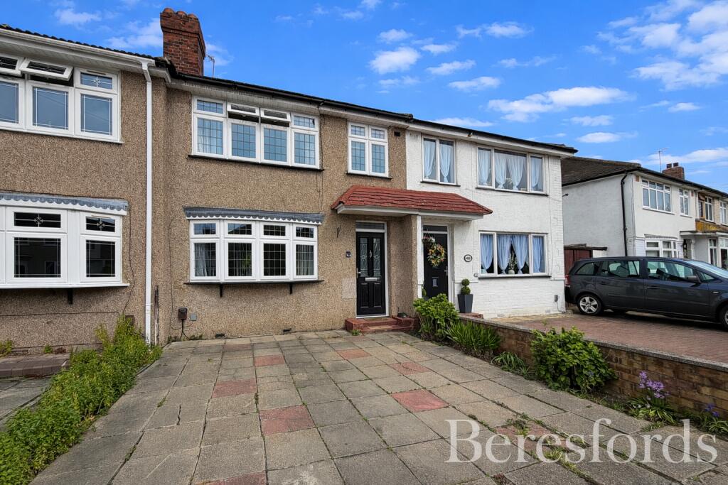 Main image of property: Woodcote Avenue, Hornchurch, RM12