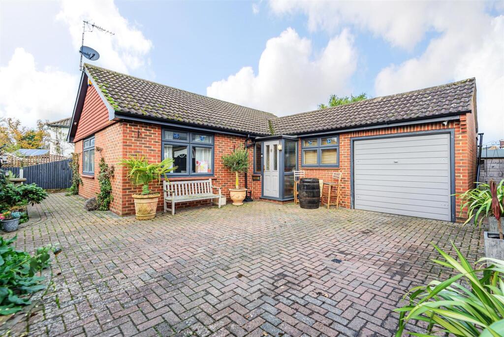 Main image of property: Woodlands Road, Epsom, KT18