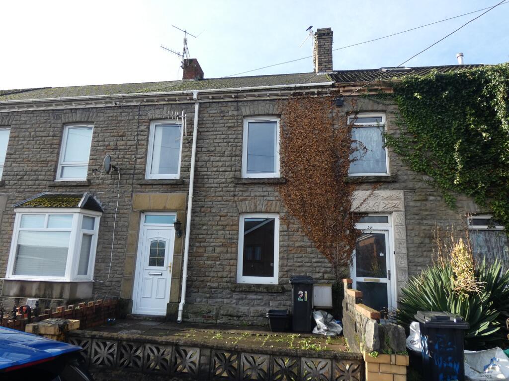 Main image of property: 21 High Street, Skewen, Neath. SA10 6NB