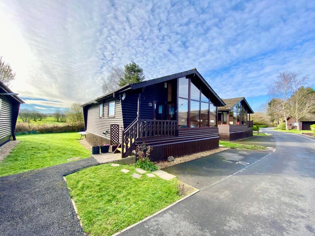 Main image of property: Pine Lake, Dock Acres, Carnforth, Lancashire, LA6