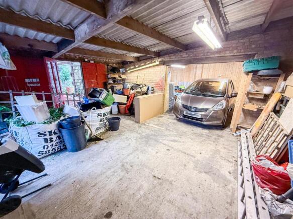 INSIDE VIEW OF GARAGE/WORKSHOP