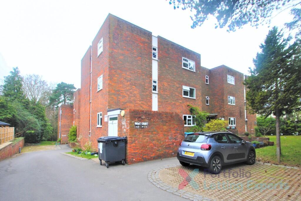 Main image of property: Spacious 2 Bedroom Flat With Underground Parking - Moat Court, Branksome Wood Road!