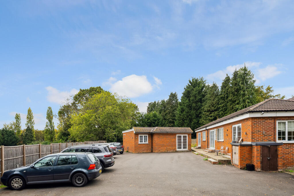 Main image of property: Sandhills Lane, Virginia Water, GU25