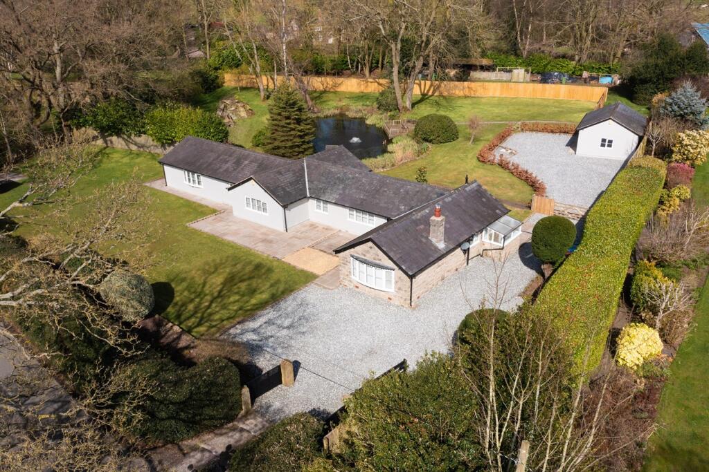 Main image of property: Detached bungalow with double garage and 0.88 acre plot on Chapel Lane