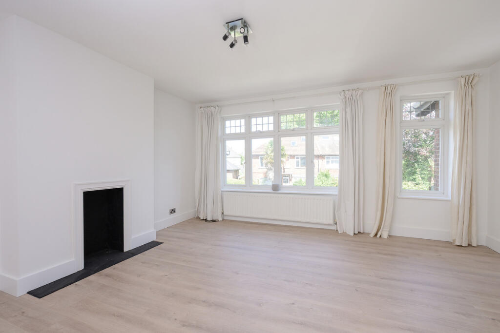 Main image of property: Courtlands Avenue, Kew, TW9