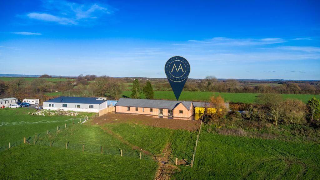 Main image of property: The Byre, Higher Cheldon Cross