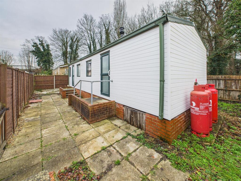 Main image of property: Scours Lane, Tilehurst, Reading