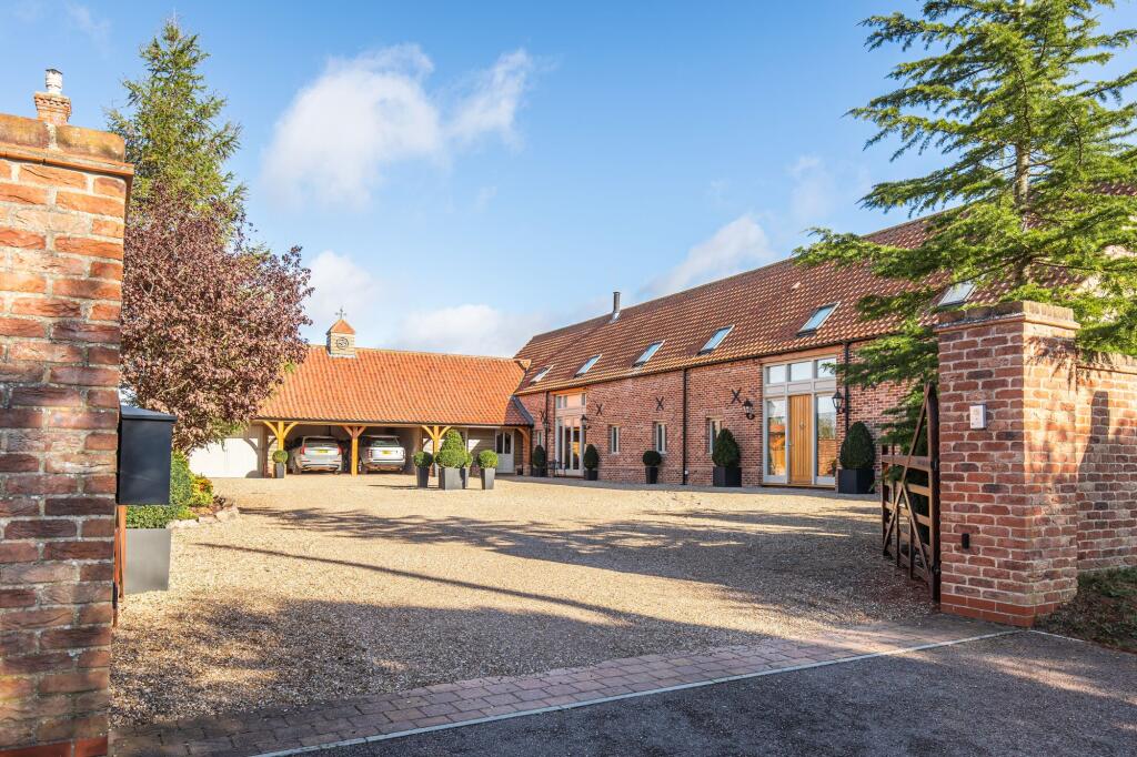 Main image of property: Exceptional Five Bedroom Barn Conversion in Gayton Thorpe