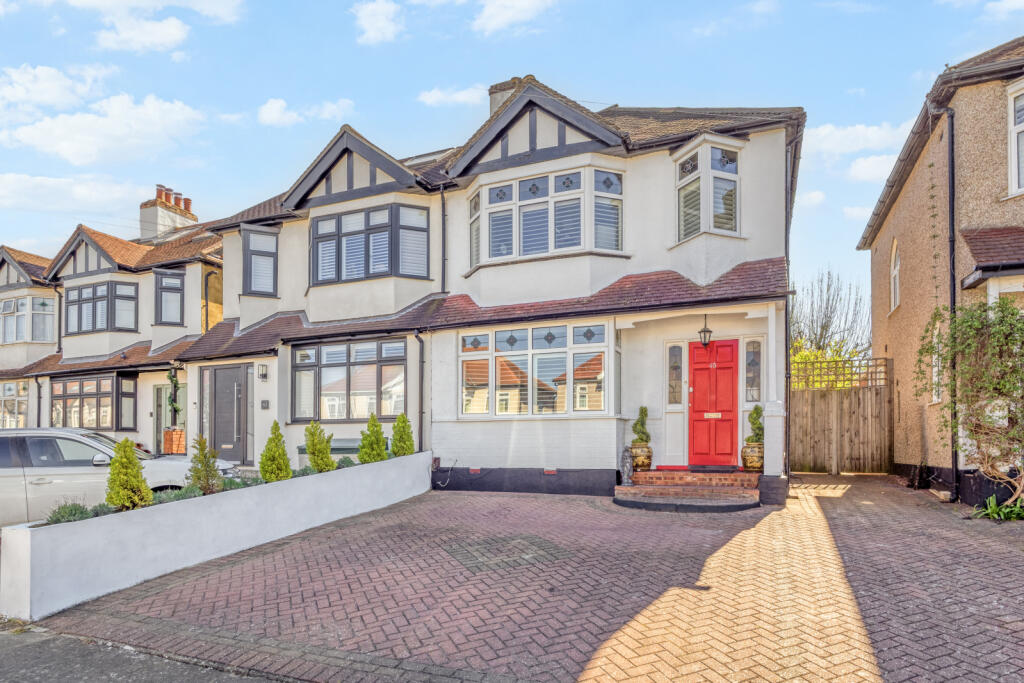 Main image of property: Carlingford Road, Morden, SM4