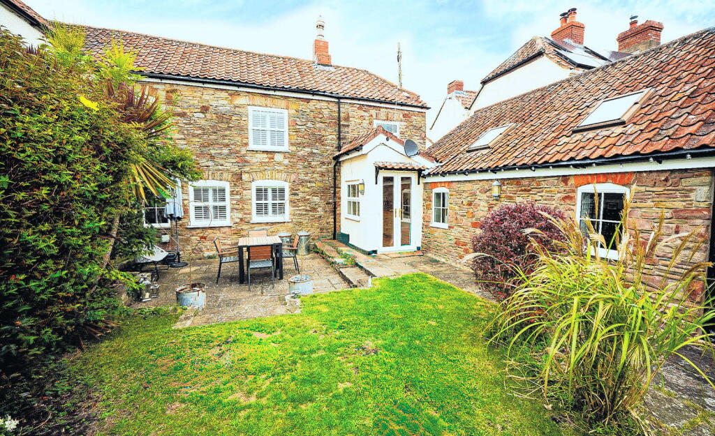 Main image of property: a lovely south facing garden - beautifully presented character home
