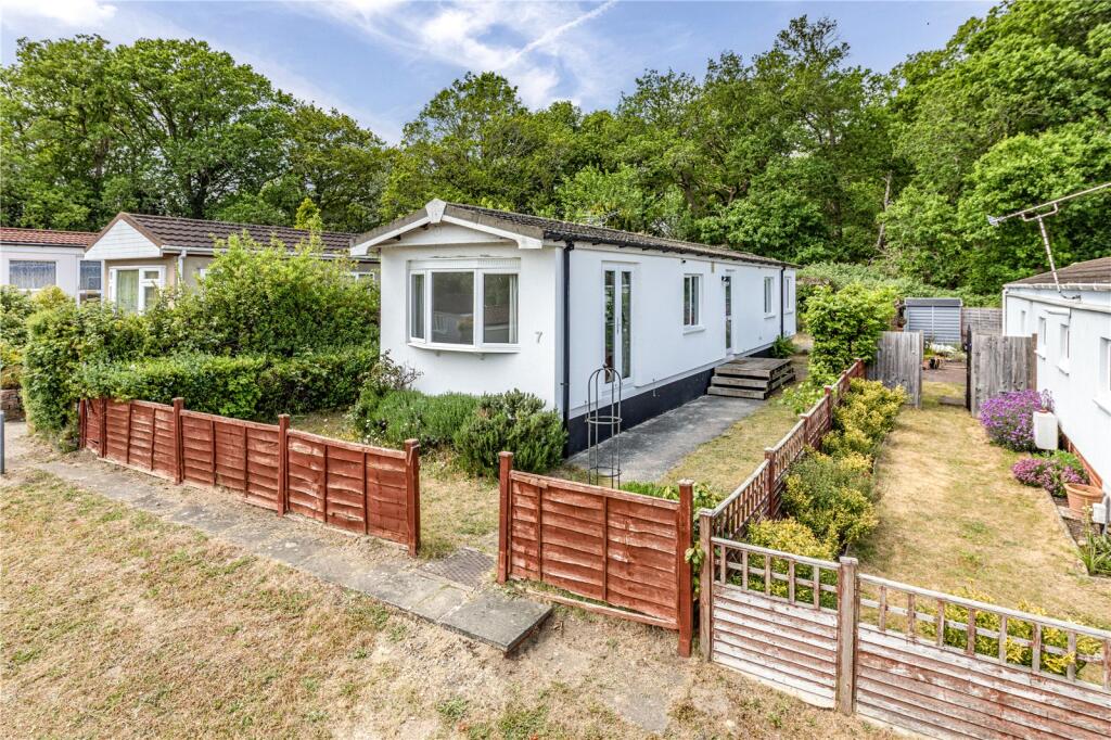 Main image of property: Warren Farm Home Park, Warren Lane, Woking, Surrey, GU22