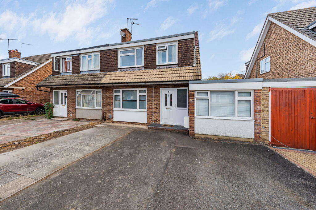 Main image of property: Moore Grove Crescent,Egham,TW20 9RH
