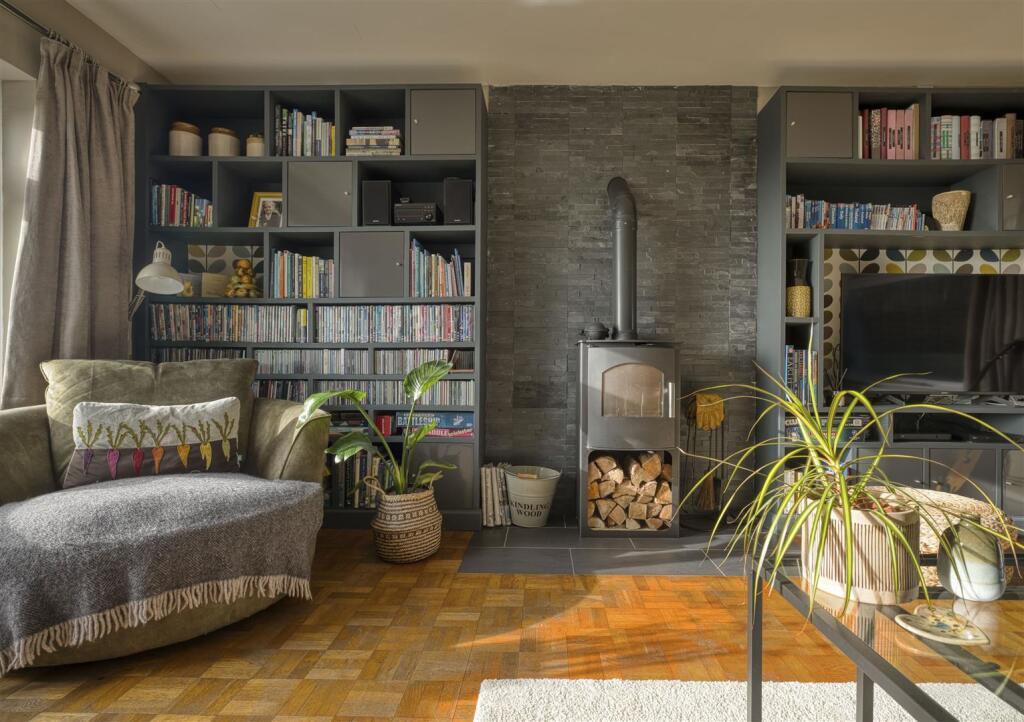 Elevated detached village home in West Horrington enjoying open views across Wells