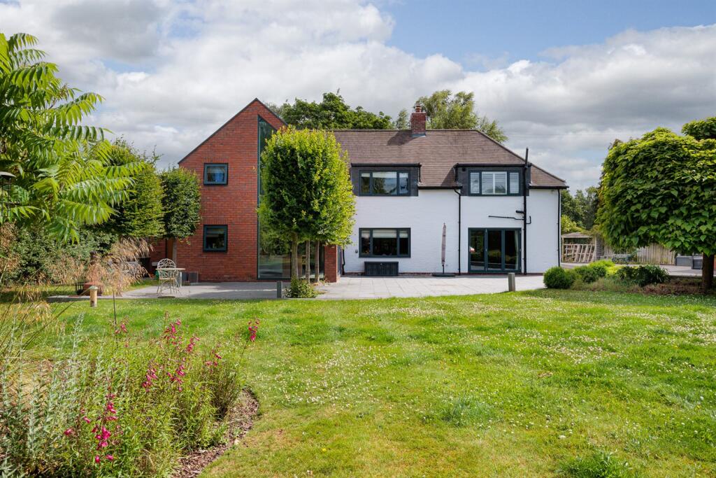 Main image of property: The White House, Dalefords Lane - stunning house in 0.47 acre south west facing plot