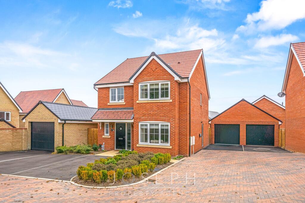 Main image of property: Woodpecker Close, Bramford, IP8