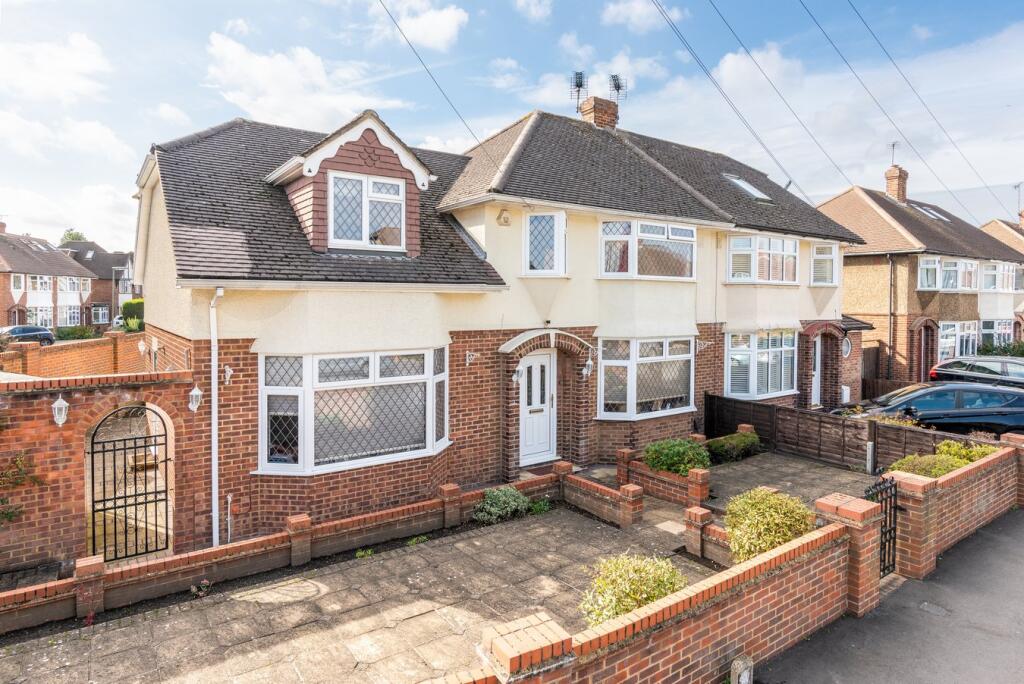 Main image of property: Holly Avenue, Walton-on-Thames, KT12