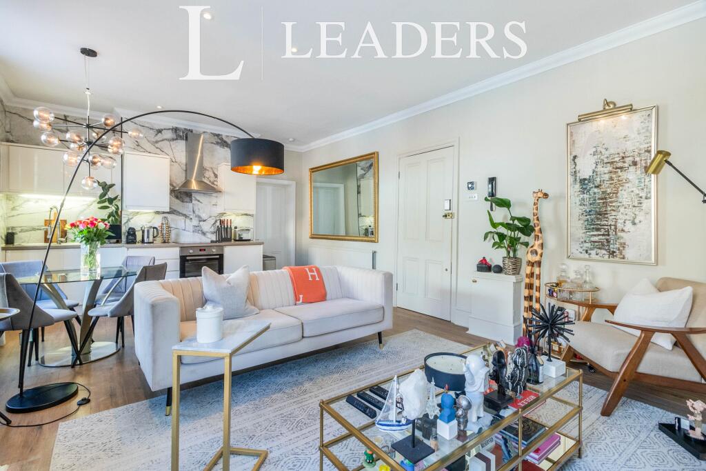 Main image of property: High Street, KT22