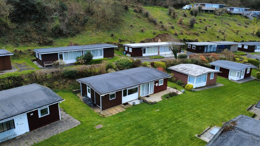 Main image of property: Summercliff Chalets, Caswell Bay, Swansea, West Glamorgan, SA3 3BP