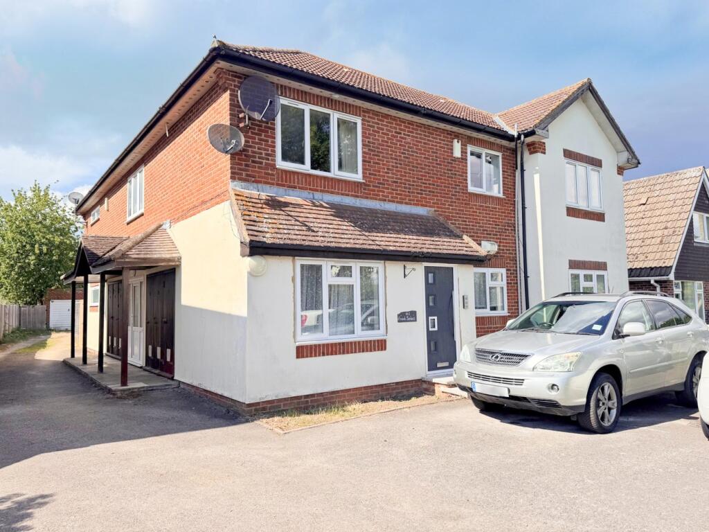 Main image of property: Field Common Lane, Walton-on-Thames, KT12