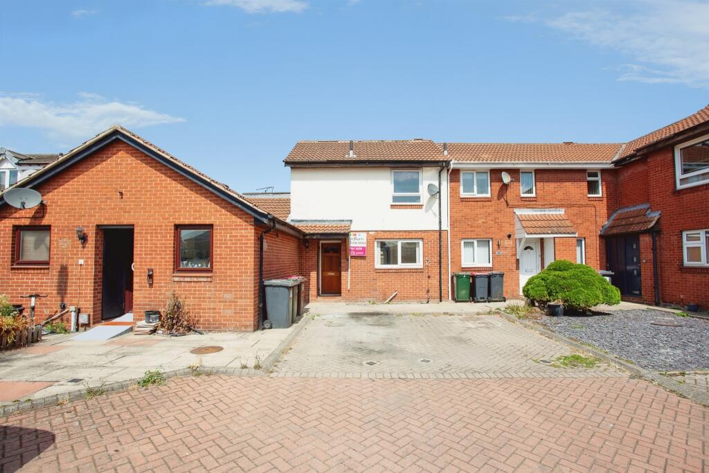 Main image of property: Grasby Court, Bramley, Rotherham
